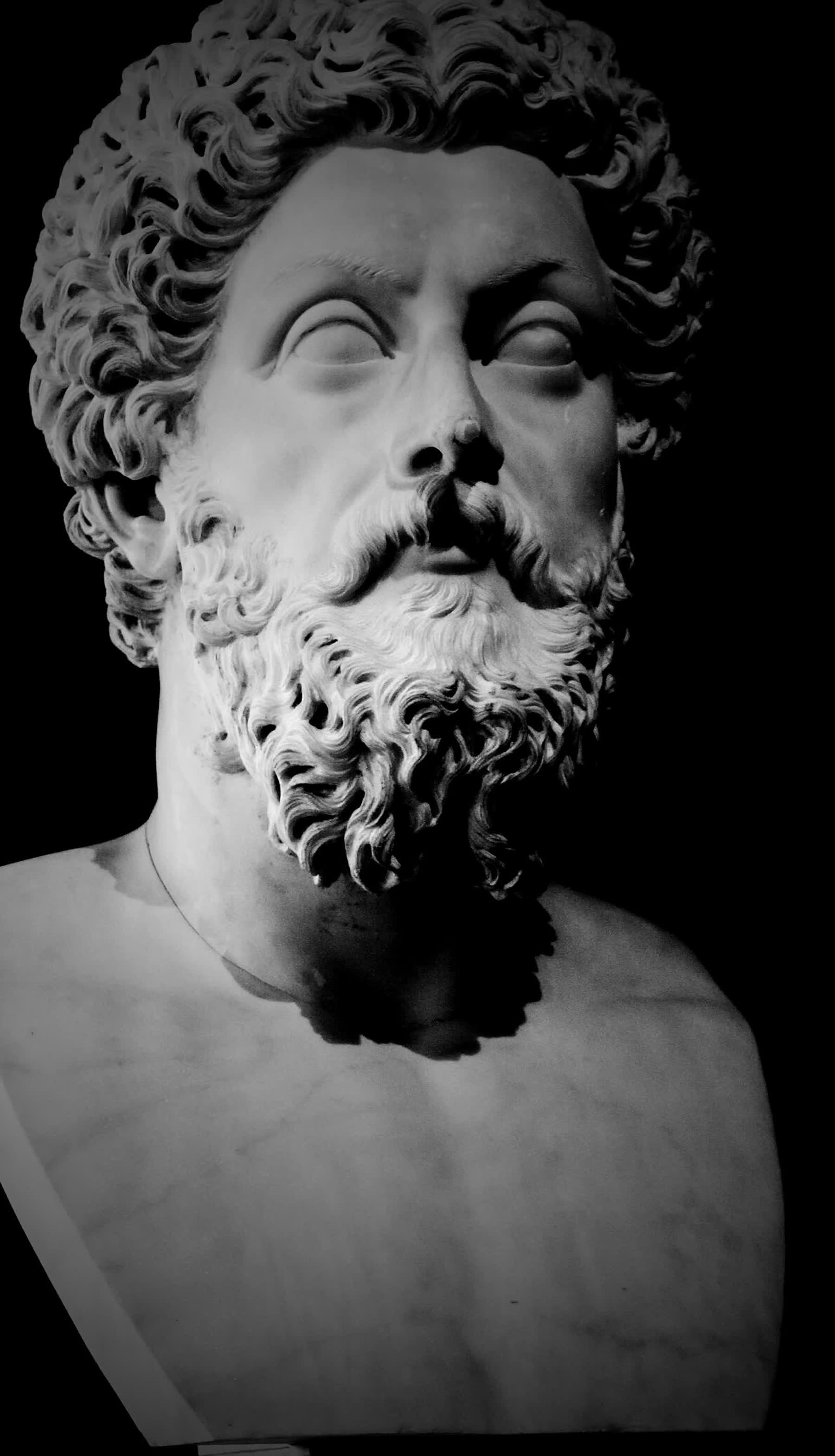 Marble portrait bust of Marcus Aurelius, Roman copy, lit from one side.